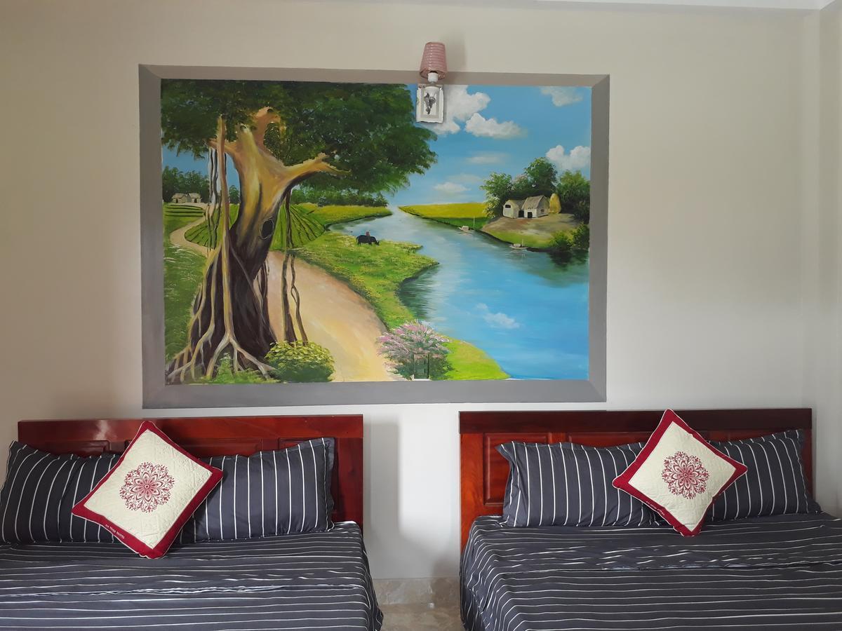 An Binh Homestay Фонгня Экстерьер фото